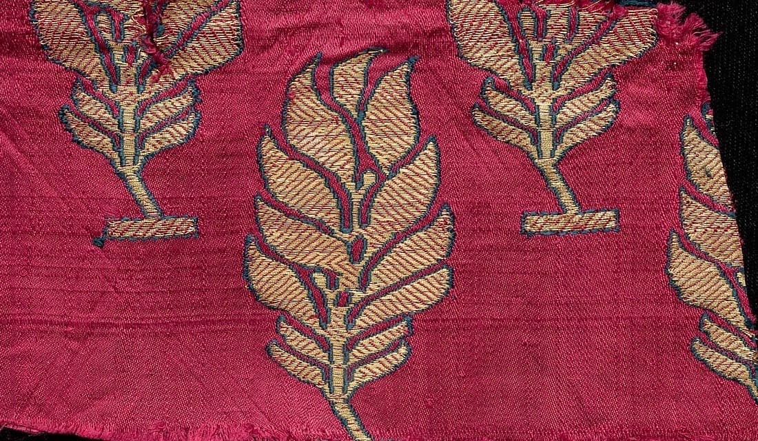 Deep crimson silk with gold leaf motifs